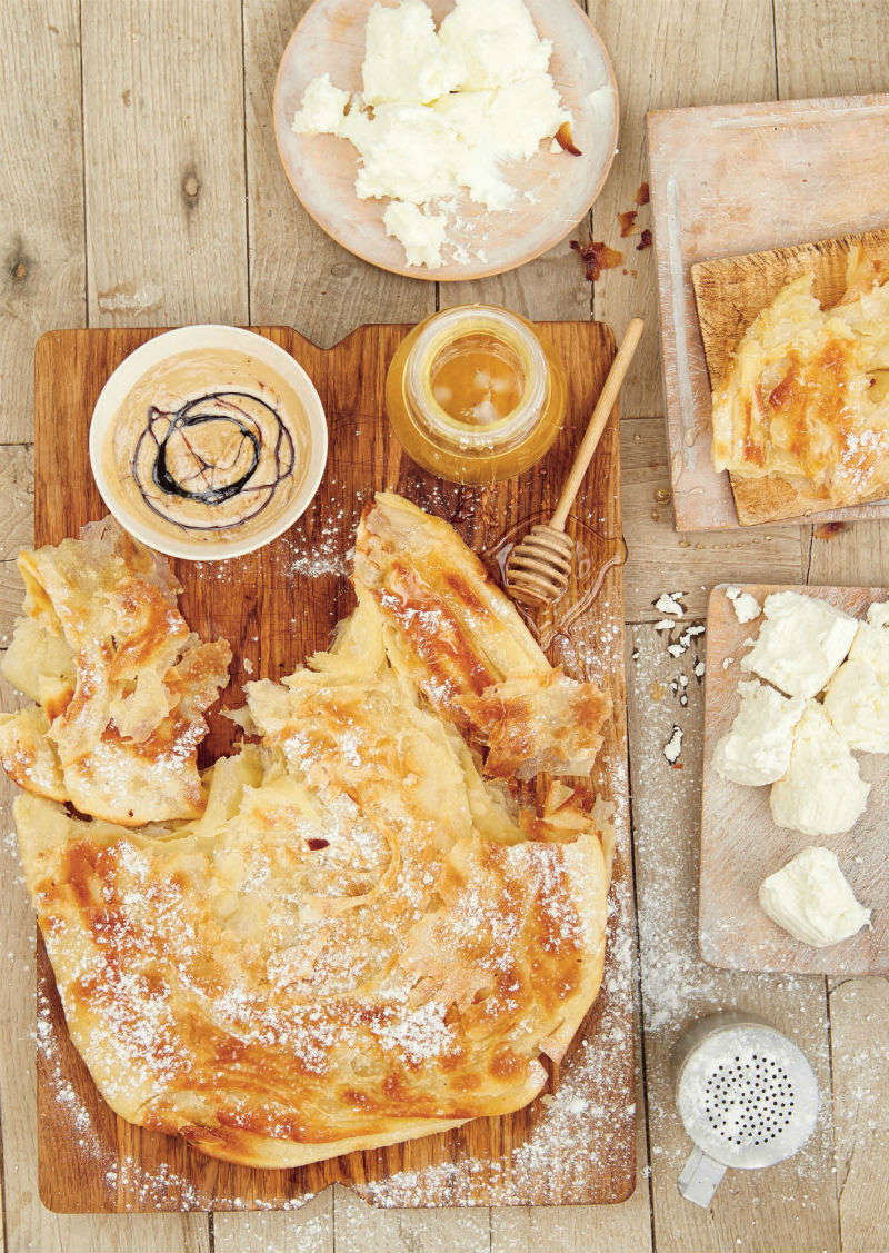 Flaky, golden, and stuffed past your imagination’s capacity. This pizza can be sweeter than honey on toast, or rich and gooey like a lasagna. Dating back to the Mamluk period this simple yet totally satisfying pizza can be packed with a wide variety of toppings. Cheese, nuts, meat, and vegetables are just the beginning.